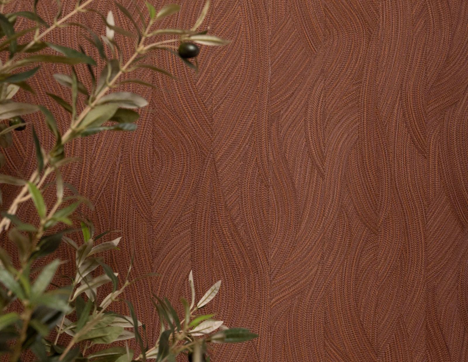 Olive branches hand-painted against a rust and terracotta textured wallpaper, detail shot