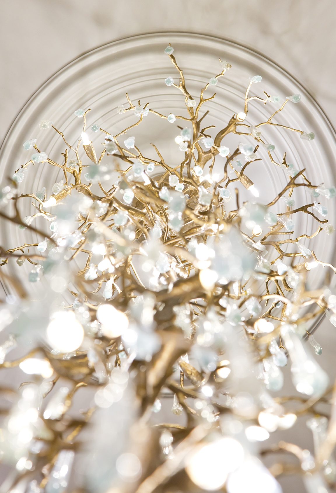 Faceted pendant lighting, specified as permanent decoration within the scheme